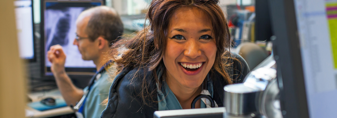 health care worker smiling looking forward