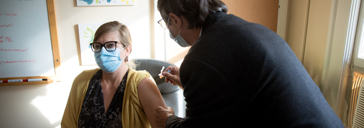 person receiving a flu shot