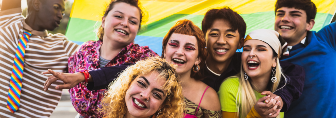 group of young people celebrating pride