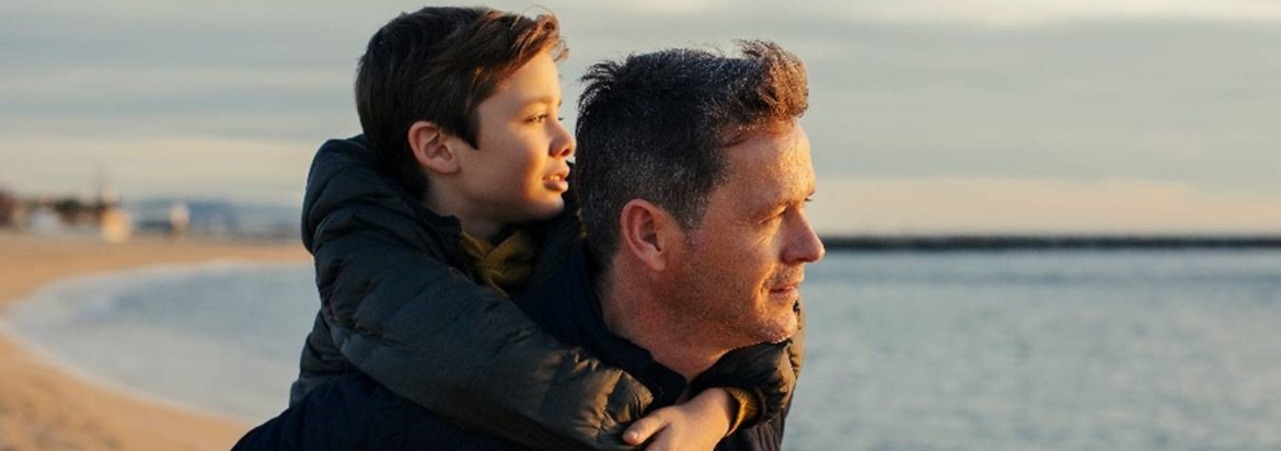 Father and son on the beach