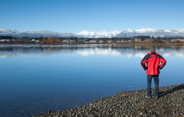 person looking out at the comox valley