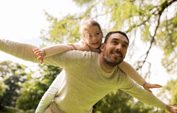 person playing with child