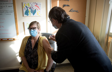 person receiving a flu shot