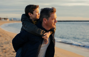 Father and son on the beach