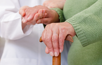 care provider holding hand