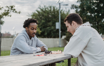 two people playing chess