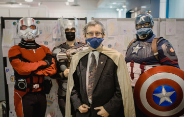 Dr. Stanwick with Superheros