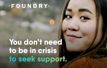 Woman smiling at camera with text that reads "you don't need to be in crisis to seek support."
