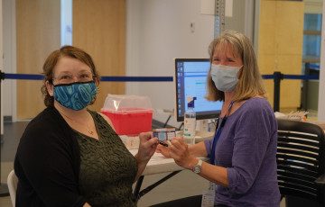 Someone receiving a vaccine