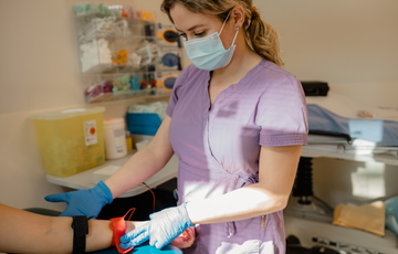 Nurse assisting a patient