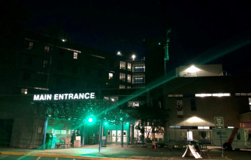 VGH lit up with green