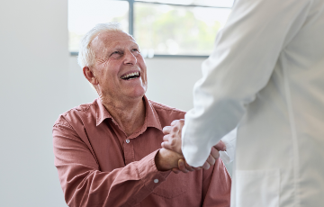senior man with care provider