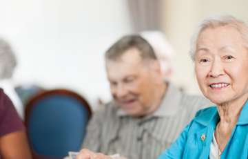 three seniors sitting at a table