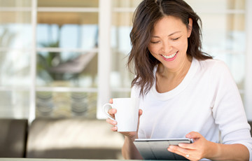 Woman using ipad for virtual care